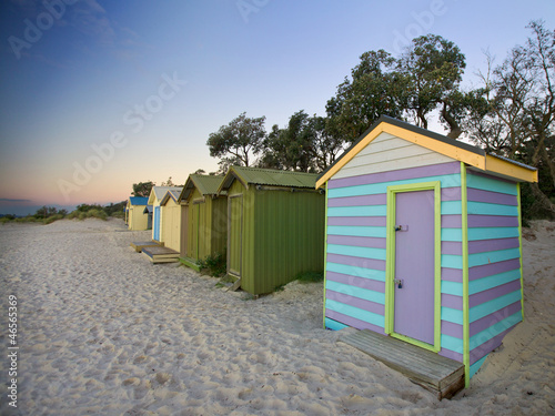 Colorful beach huts © Vividrange