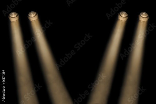 Two yellow spotlights in a smoky atmosphere