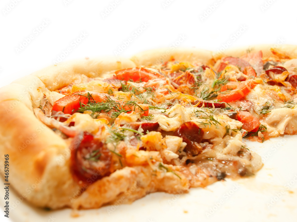 Pizza with tomato and sausage isolated on white Pizza with tomato and sausage isolated on white