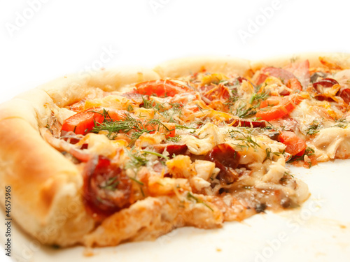 Pizza with tomato and sausage isolated on white