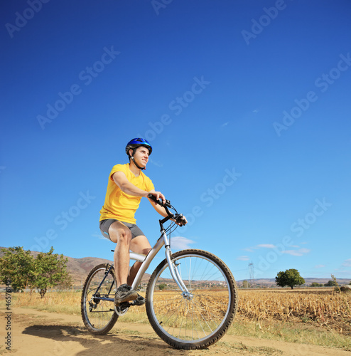 View of a biker riding a mountain bike