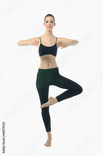 beauty woman in black stand in yoga Dancer Pose © newvave