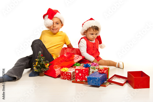 Kids with Chrostmas presents photo