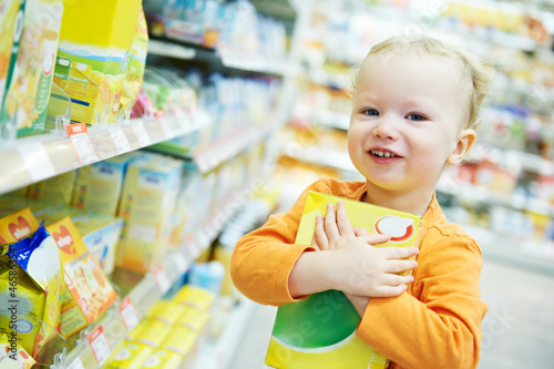 child making food shopping at grocery store