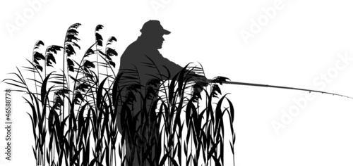 silhouette of fisherman in black reed