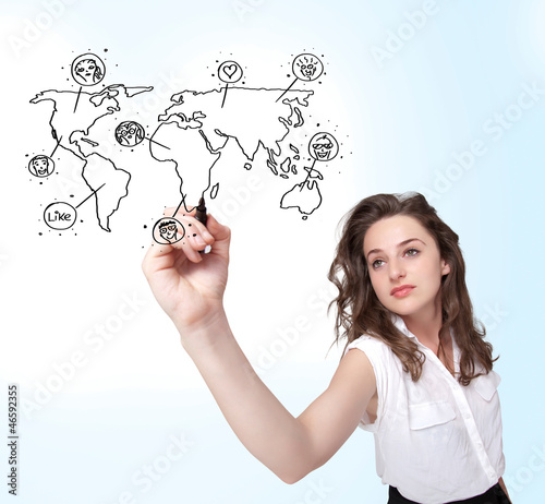 Young woman drawing a social map on whiteboard