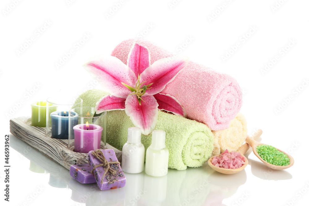 towels with lily, aroma oil, candles, soap and sea salt towels with lily, aroma oil, candles, soap and sea salt