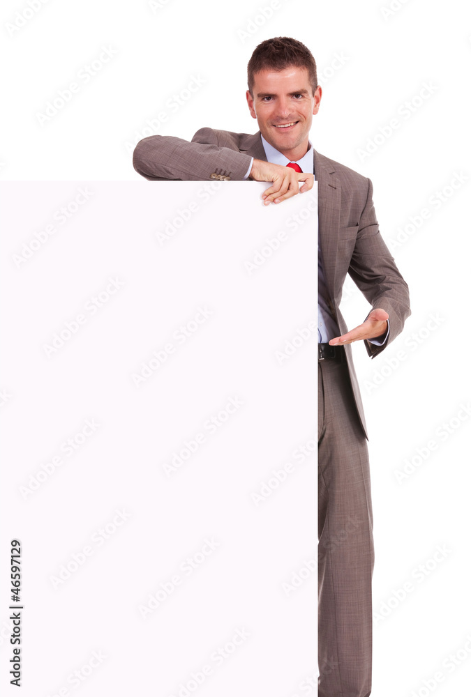 business man presenting blank board