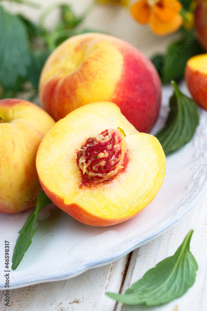 Fresh peaches on a plate Fresh peaches on a plate