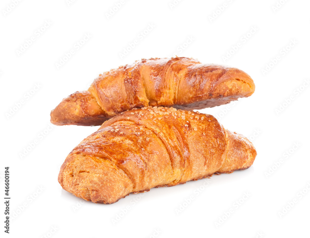 Freshly baked croissants on a white background