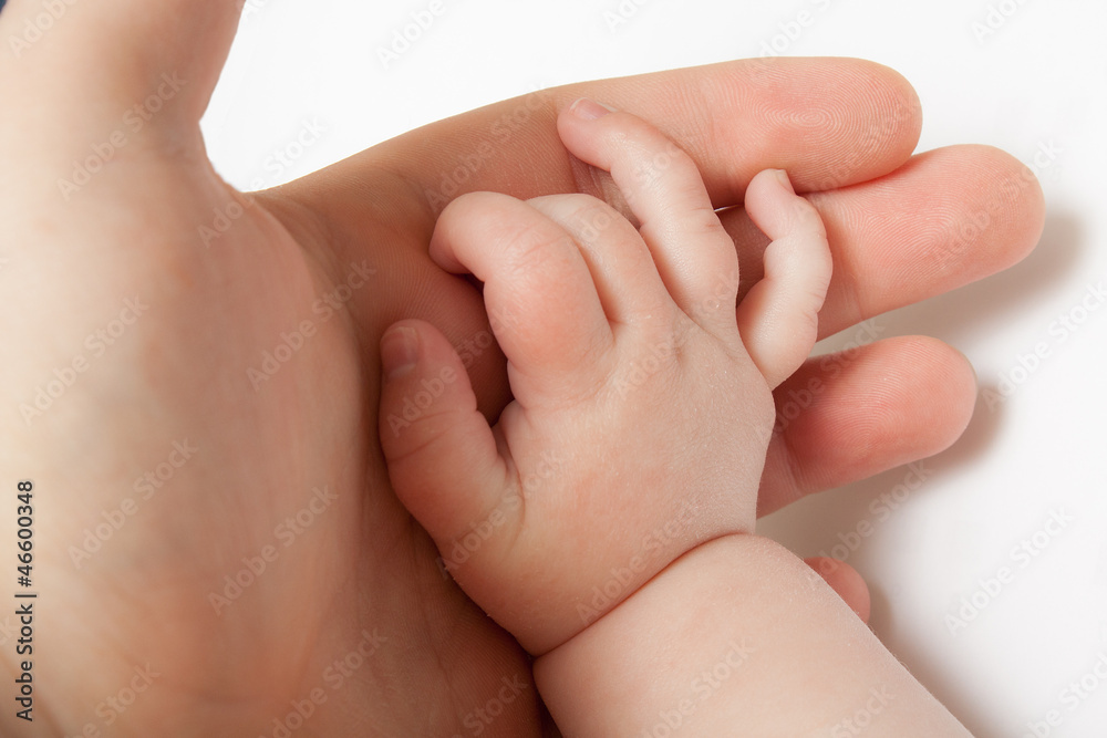 Grabbing the hand of a child