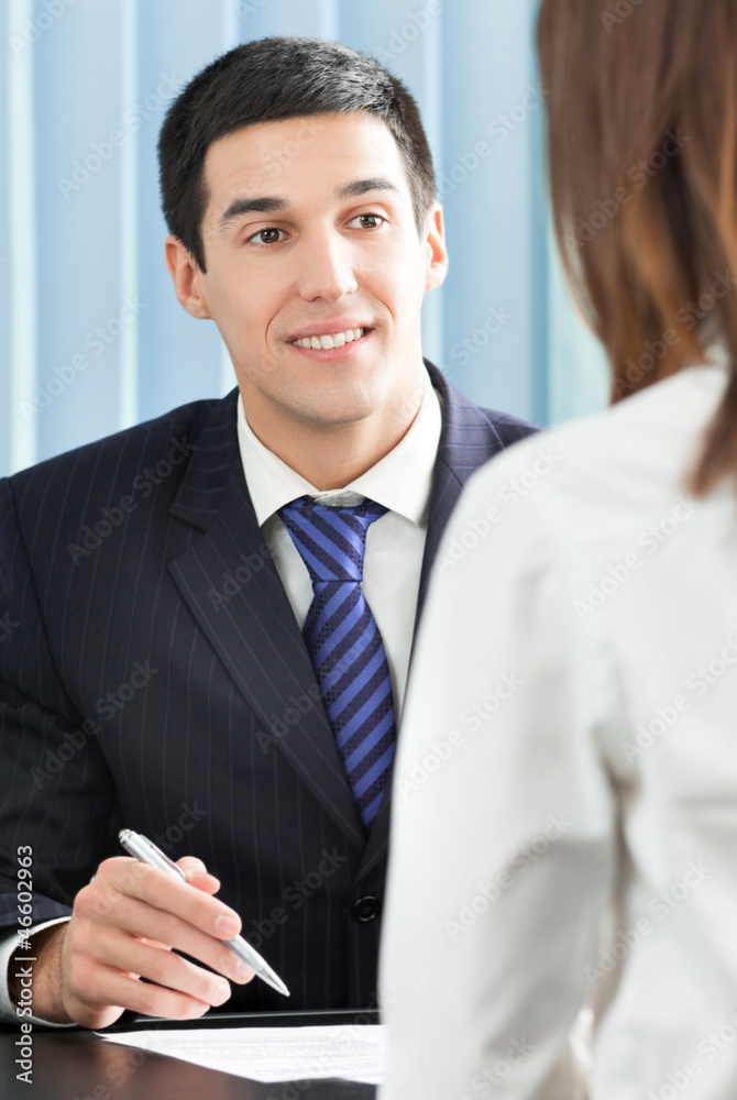 Happy businesspeople or businessman and client Happy businesspeople or businessman and client