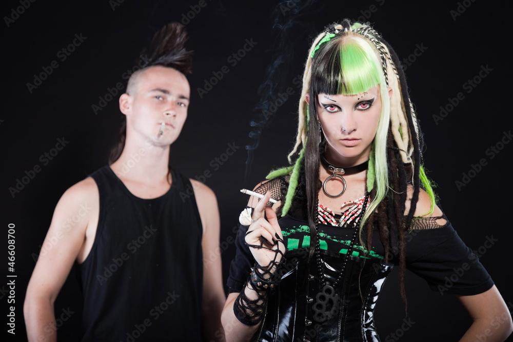 Couple of cyber punk girl punk rock man smoking a cigarette. Stock-Foto |  Adobe Stock