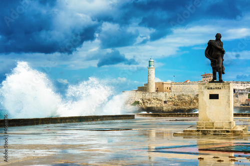 The castle of El Morro in Old Havana among huge sea waves © kmiragaya