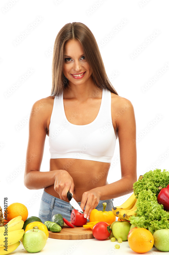 beautiful young woman cutting vegetables, isolated on white beautiful young woman cutting vegetables, isolated on white