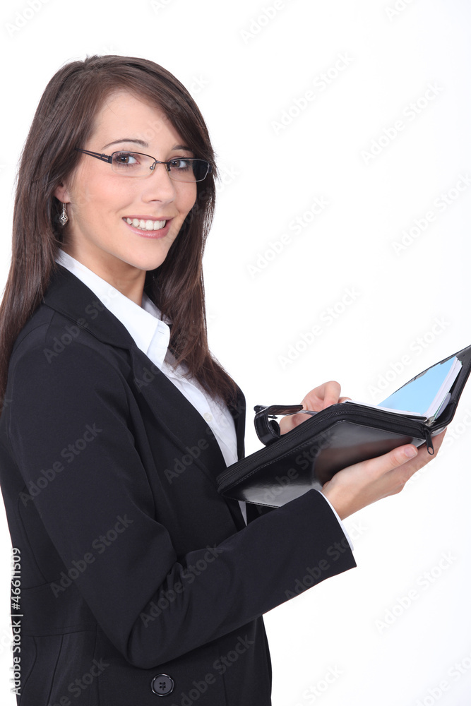 Young woman with a personal organizer Young woman with a personal organizer