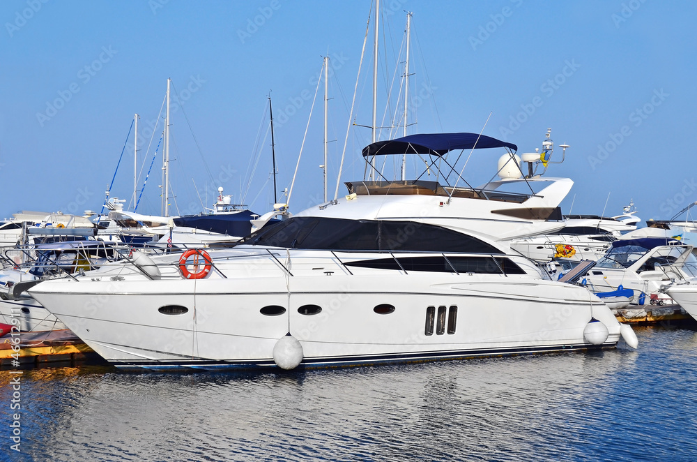 Fototapeta premium White motor yacht over harbor pier, Odessa, Ukraine