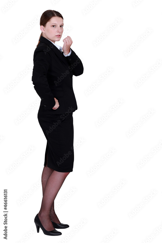 Young employee standing on white background Young employee standing on white background