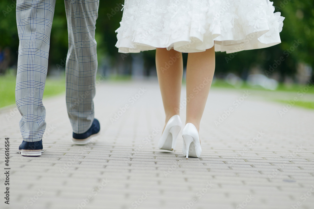 Bride and groom's legs