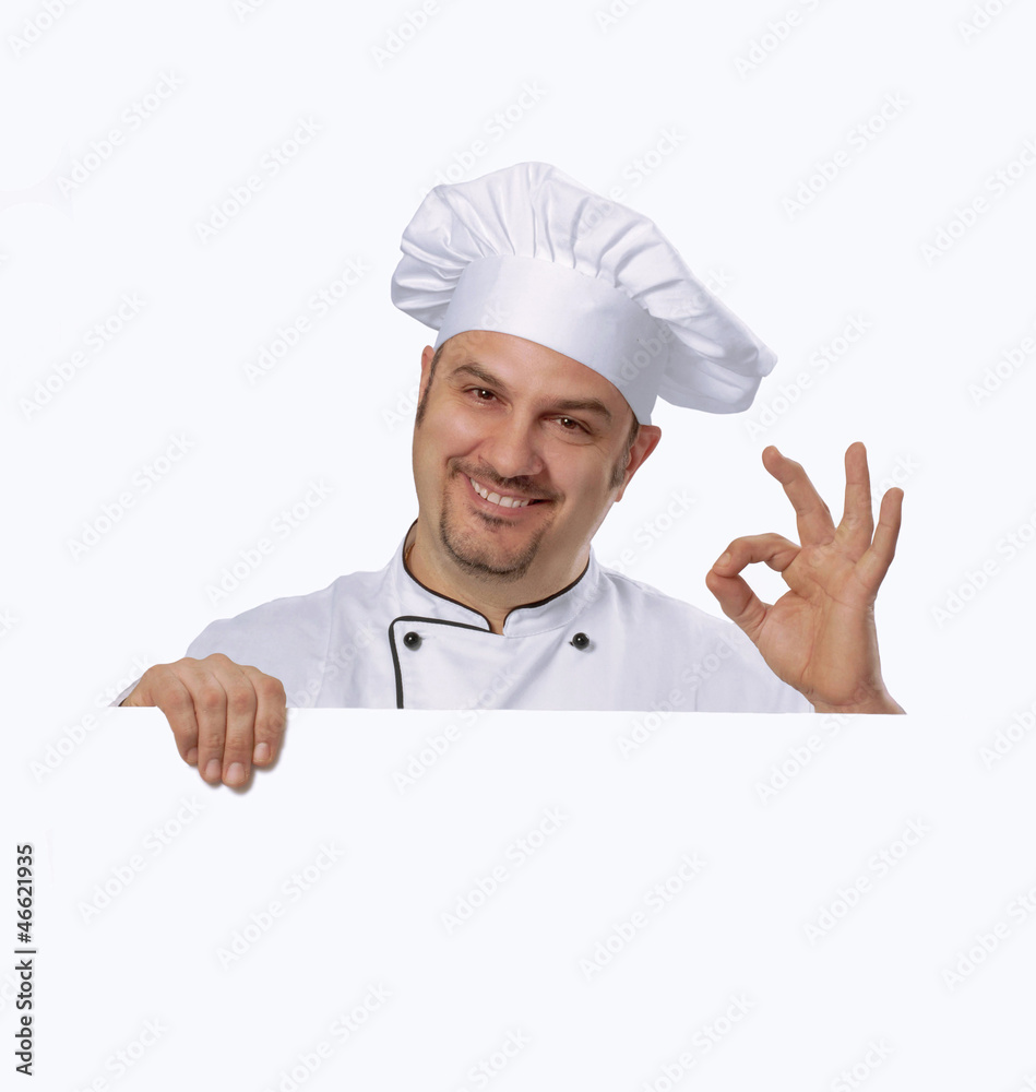Cocinero chef sujetando un panel blanco,retrato de un cocinero. Cocinero chef sujetando un panel blanco,retrato de un cocinero.
