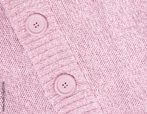 background with Knitted pink sweater with buttons Knitted woole