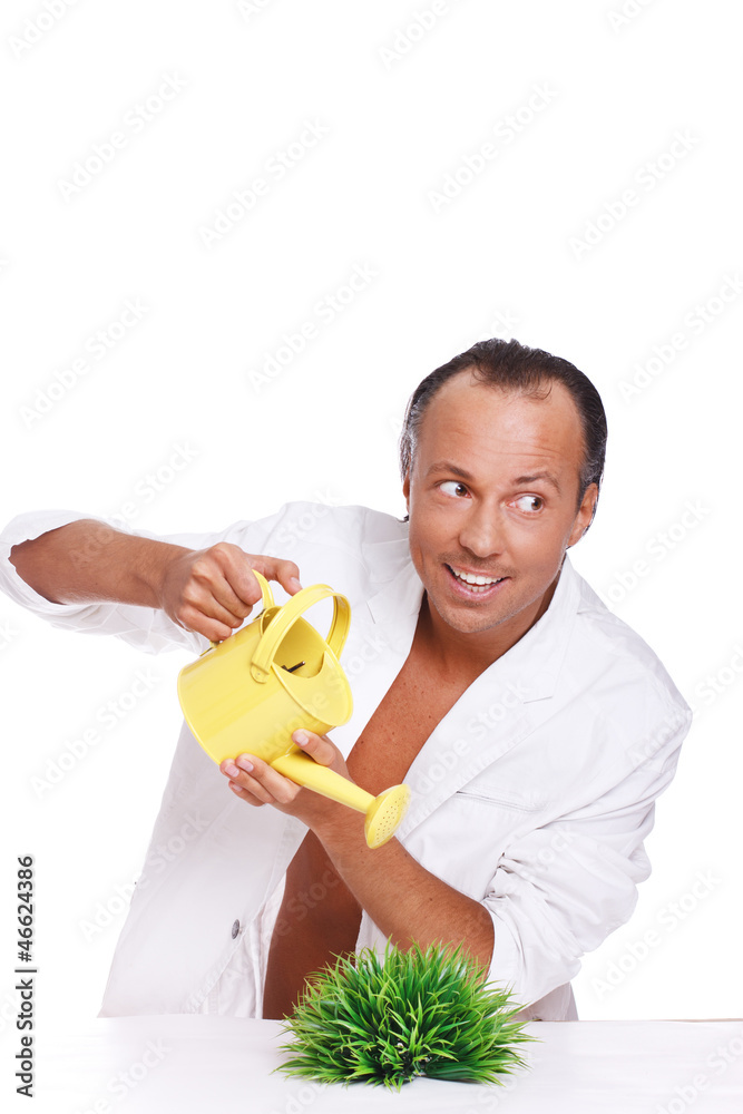Portrait of handsome man posing on white background with waterin Portrait of handsome man posing on white background with waterin