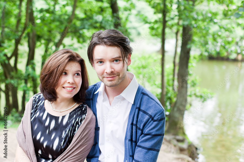 Young couple in love in forest Young couple in love in forest