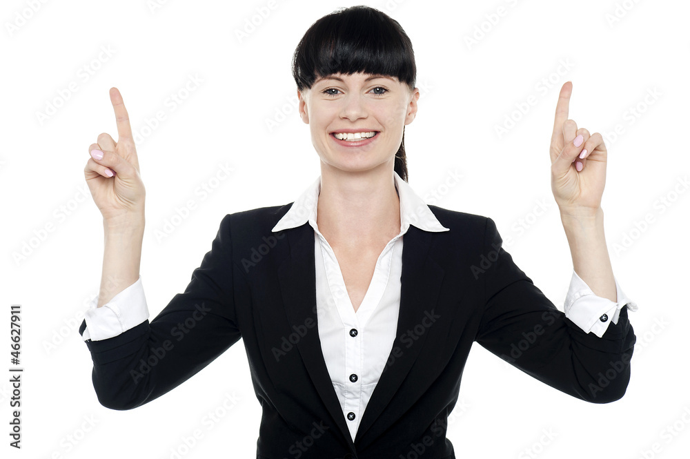 Smiling woman posing with raised fingers Smiling woman posing with raised fingers