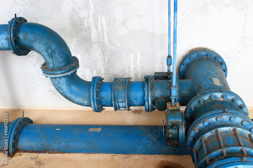 Water pumping station, industrial interior and pipes