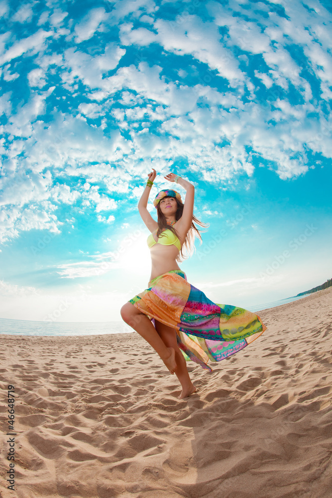 Luxurious beautiful fashionable woman on the beach Luxurious beautiful fashionable woman on the beach