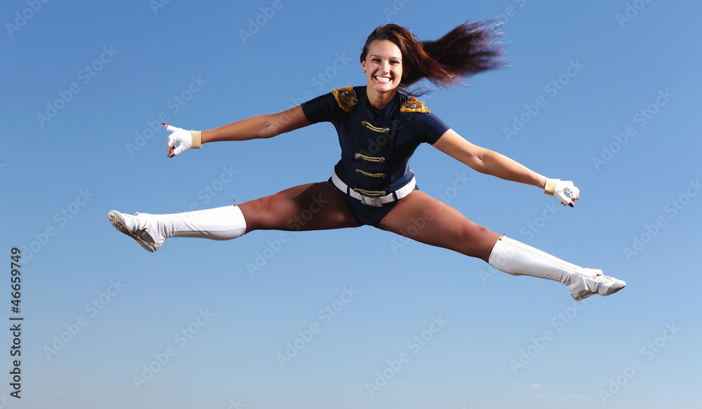 Young female dancer against white background Young female dancer against white background