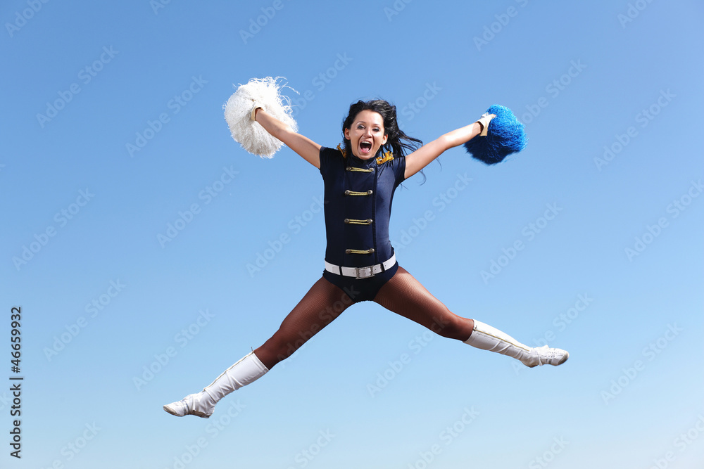 Young female dancer against white background