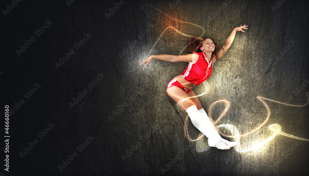 Young woman dancer. With lights effect.