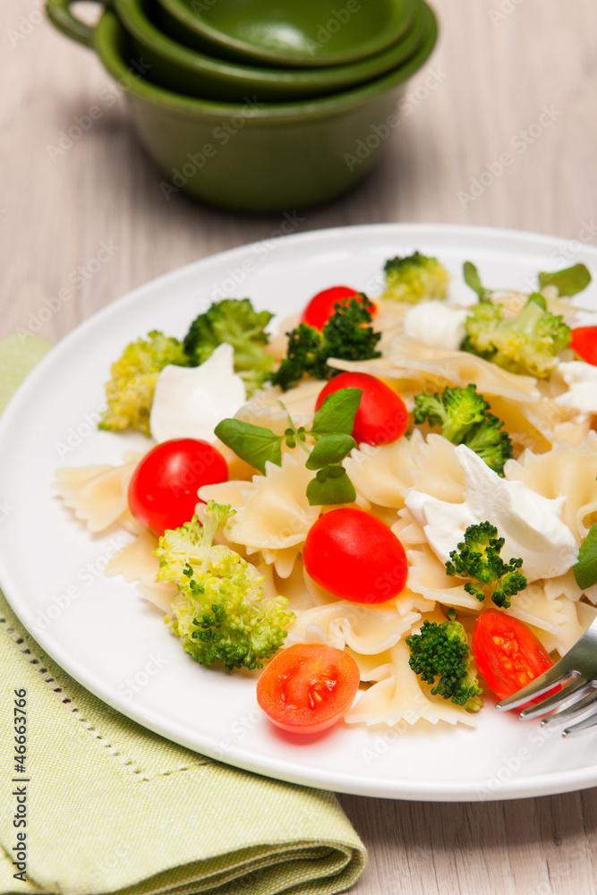Farfalle pasta with broccoli and cherry tomatoes Farfalle pasta with broccoli and cherry tomatoes
