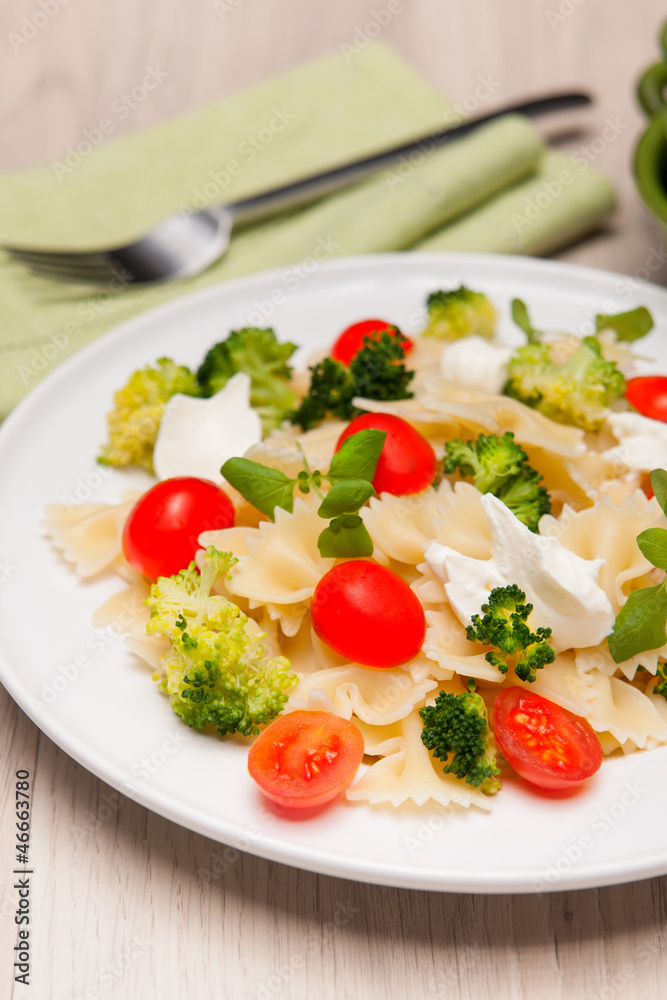 Farfalle pasta with broccoli and cherry tomatoes Farfalle pasta with broccoli and cherry tomatoes