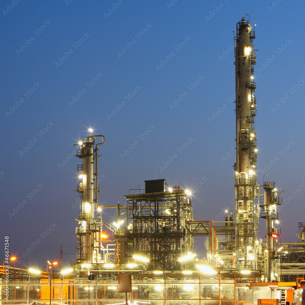 Oil refinery at twilight - factory - petrochemical plant