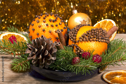 Christmas decorative composition with orange pomanders close ap