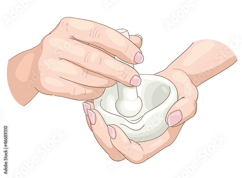 Women's hands with a pestle and mortar.