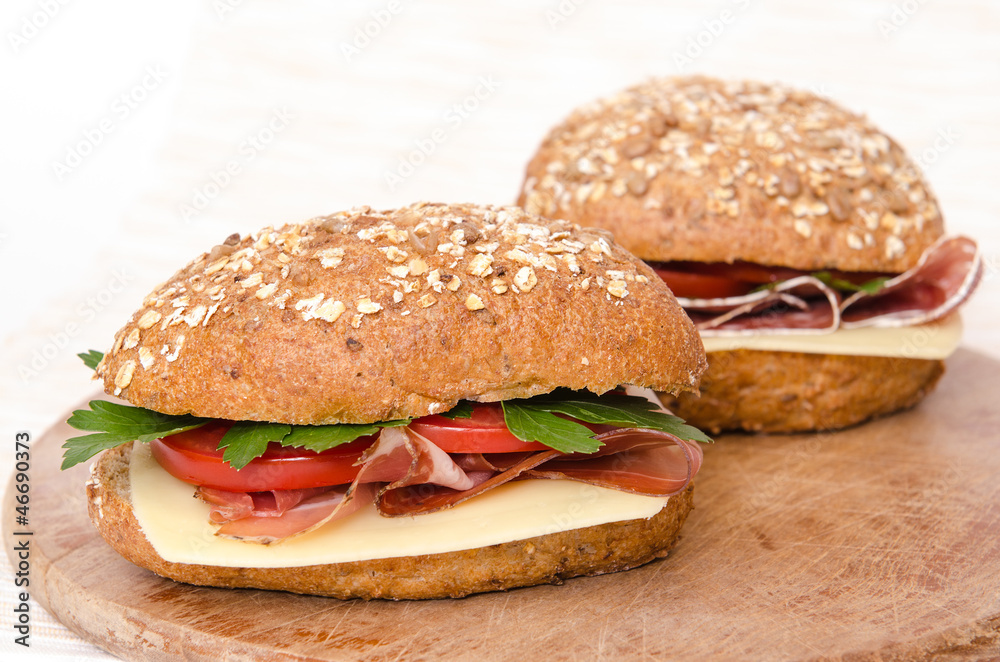 Zwei Vollkornbrötchen mit Schinken und Salami Stock Photo | Adobe Stock