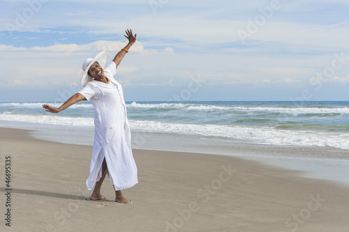 Happy African American Woman Dancing on Beach