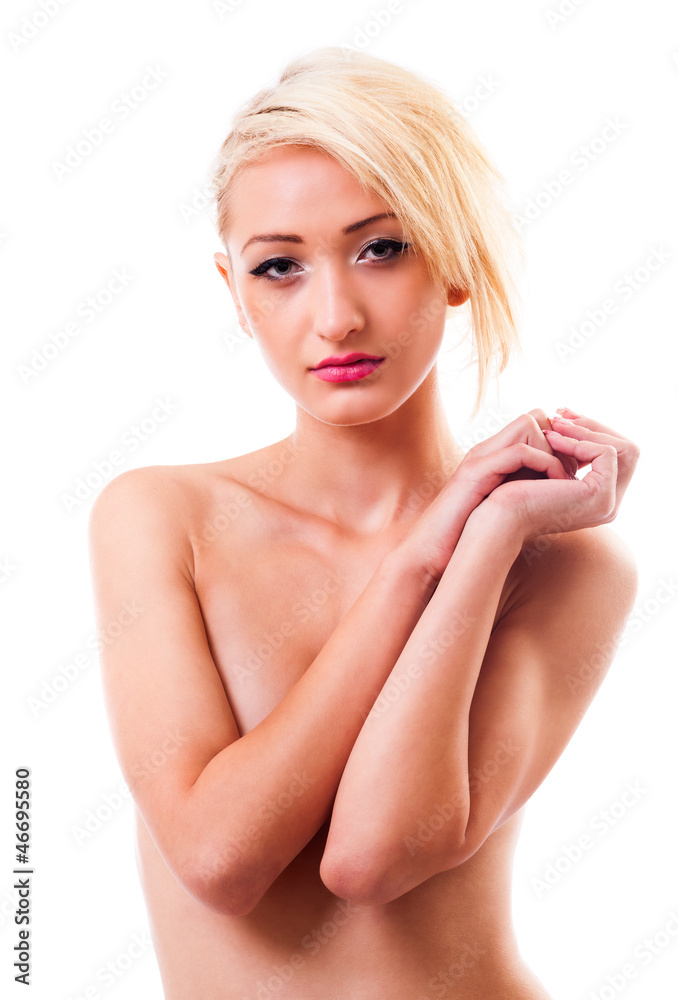 Beautiful topless woman covering her breasts Beautiful topless woman covering her breasts