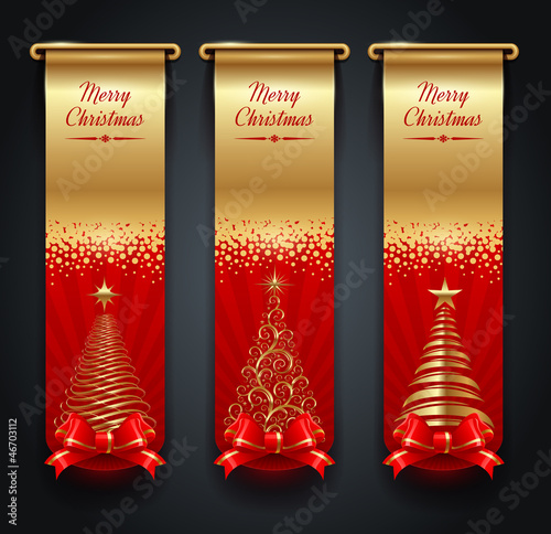 Vertical golden banners with greetings and Christmas trees