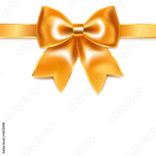 Golden bow of silk ribbon, isolated on white background