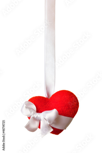 Red heart with a ribbon isolated on white (with clipping path)