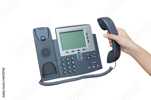 Holding IP phone isolated over white backgroud