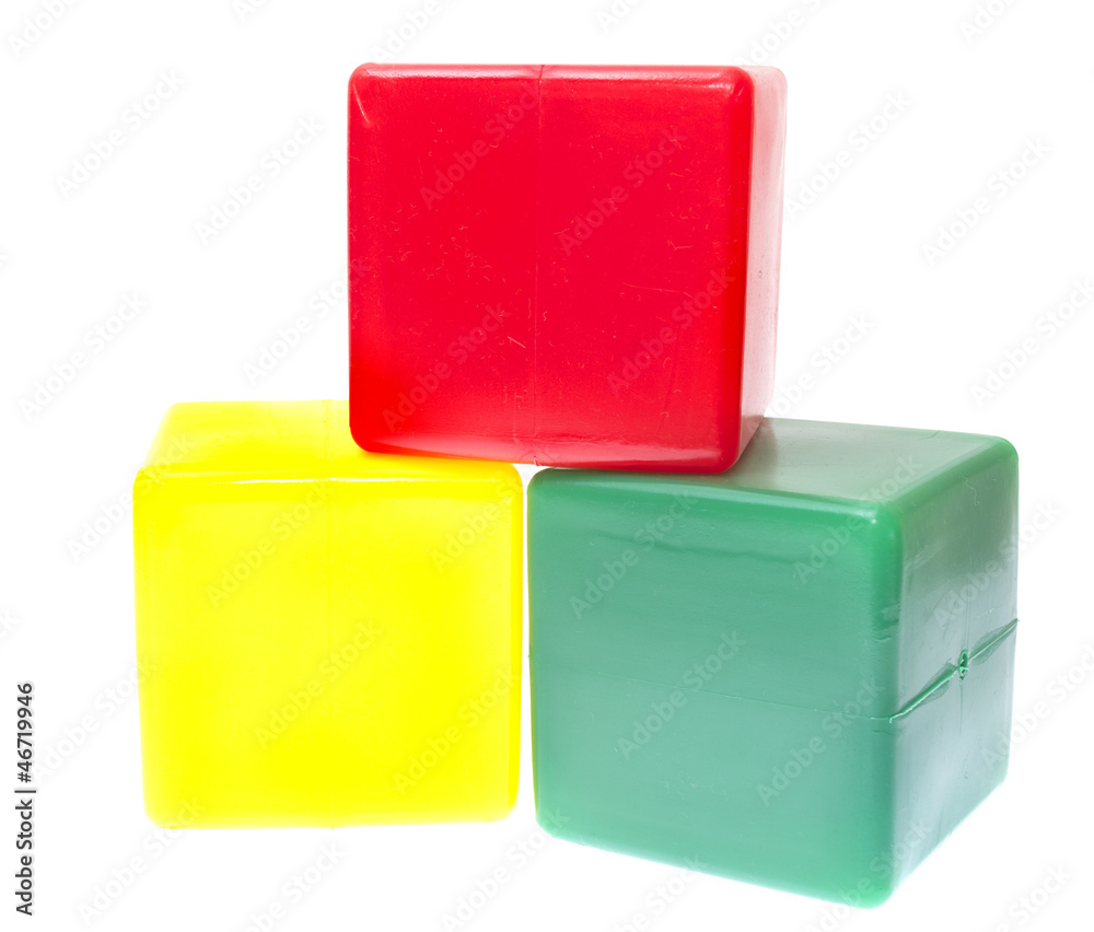 Children's pyramid from color cubes isolated on white background