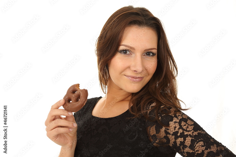 Beautiful lady eating ginger bread Beautiful lady eating ginger bread