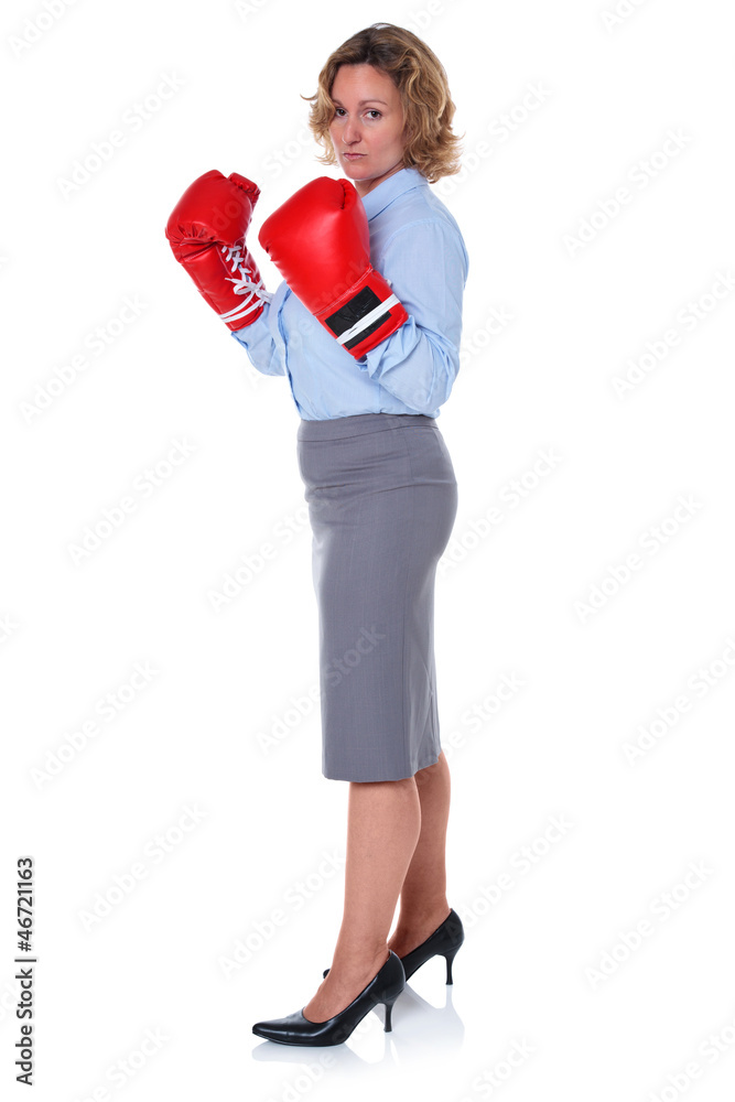 Businesswoman wearing boxing gloves Businesswoman wearing boxing gloves
