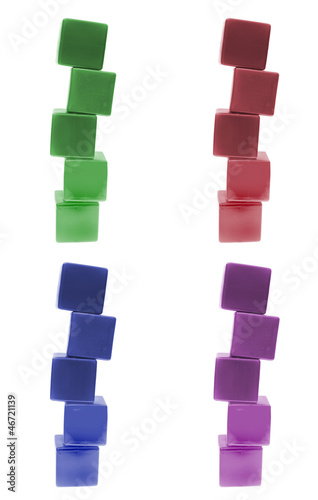 Children's pyramid from color cubes isolated on white background