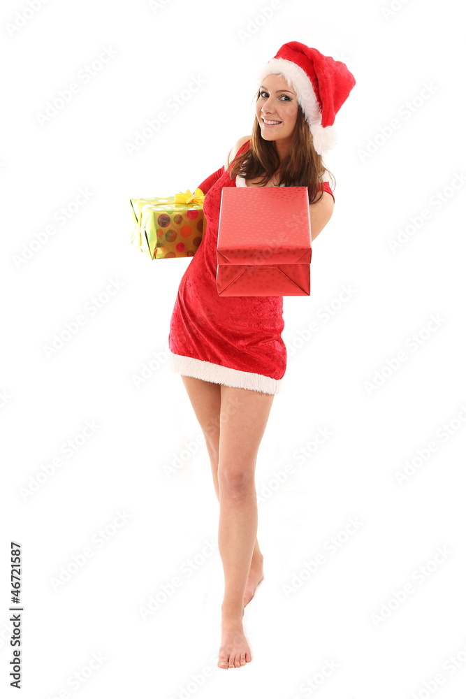Woman in santa claus costume presenting gifts Woman in santa claus costume presenting gifts